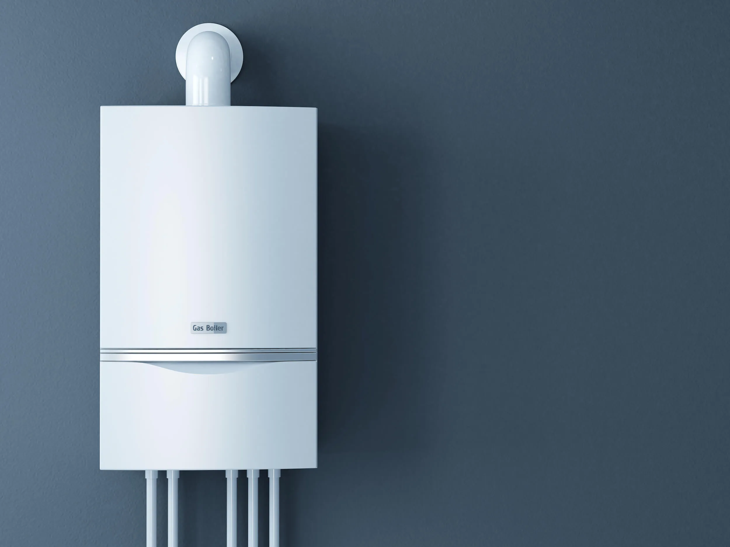 White wall-mounted gas boiler on a grey wall